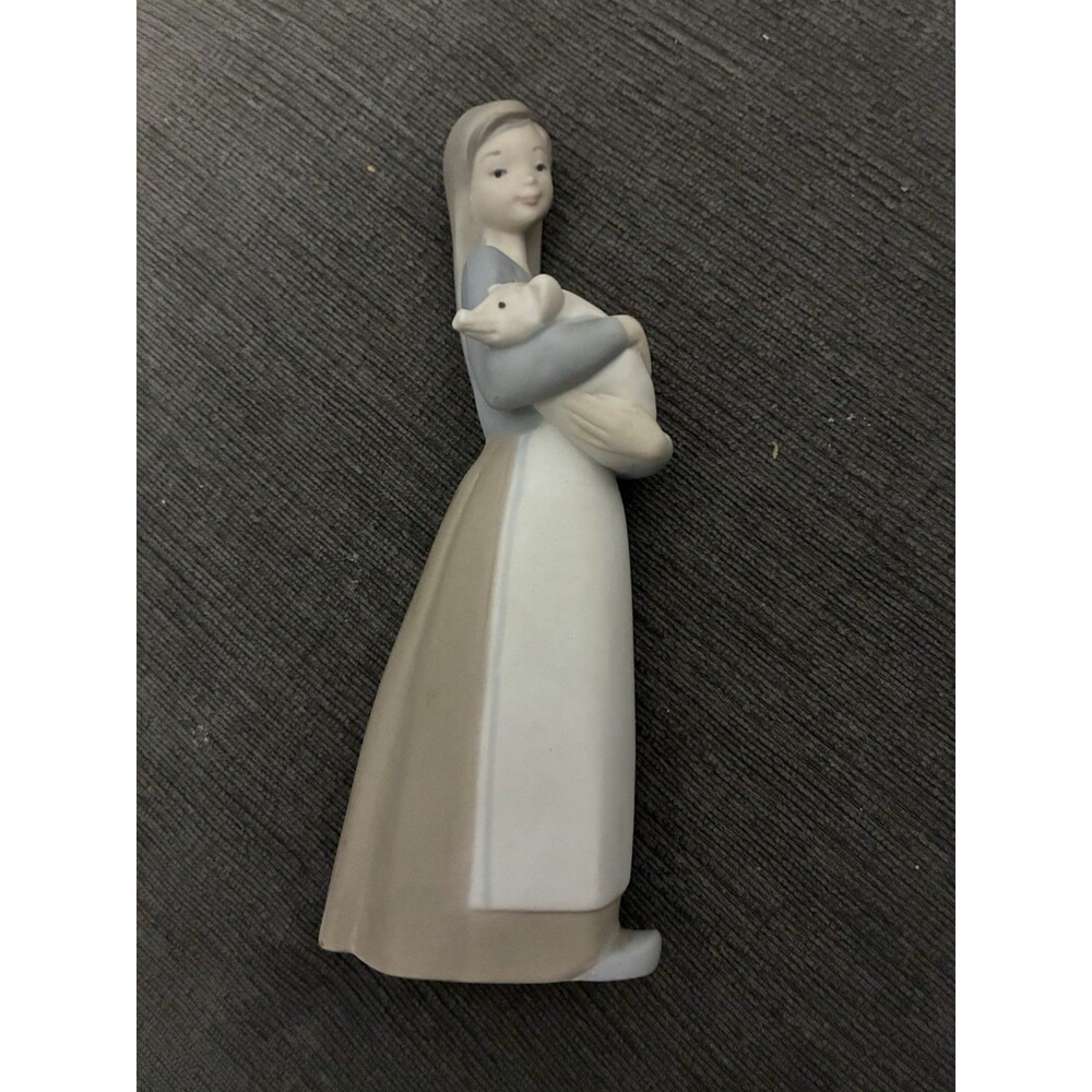 Retired Lladro “Girl with Pig” #1011
